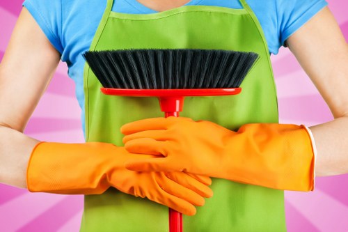 Staff member wearing PPE during carpet cleaning